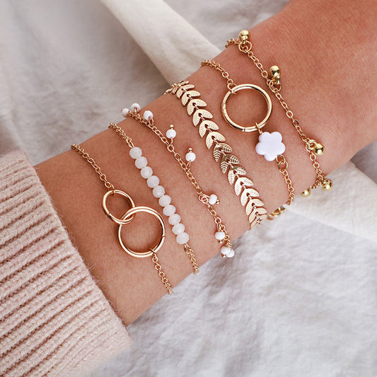 Pack Boho Armbänder in Gold