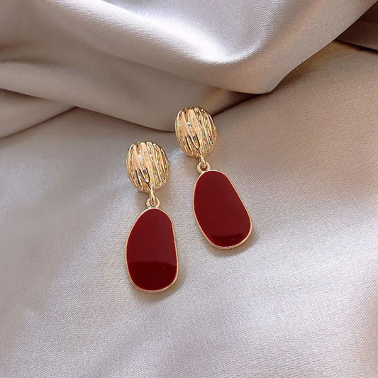 Elegante Ohrringe in Gold und Rot